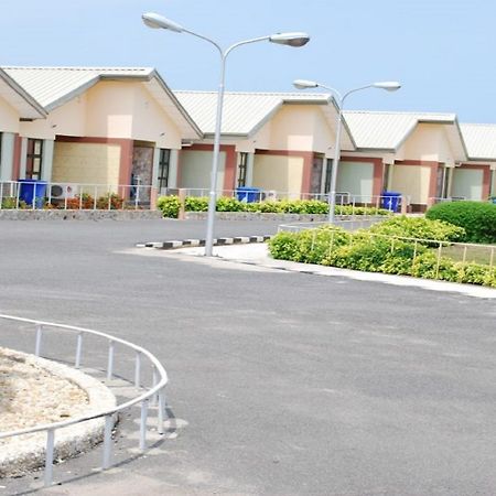 Whispering Palms Resort Magbon Bagian luar foto