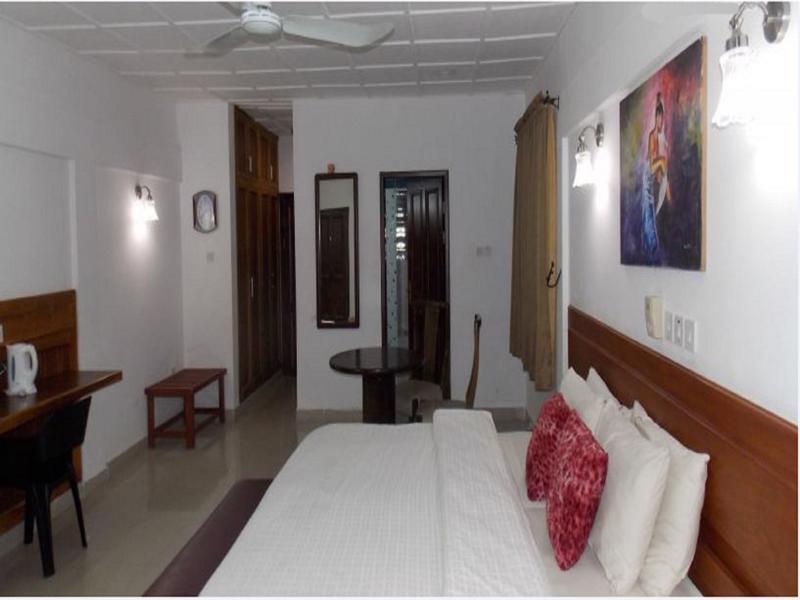 Whispering Palms Resort Magbon Bagian luar foto